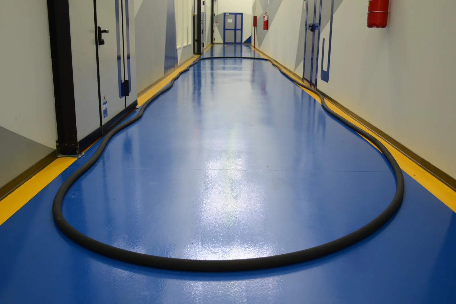 Large O ring laid out on the factory floor showing its full diameter
